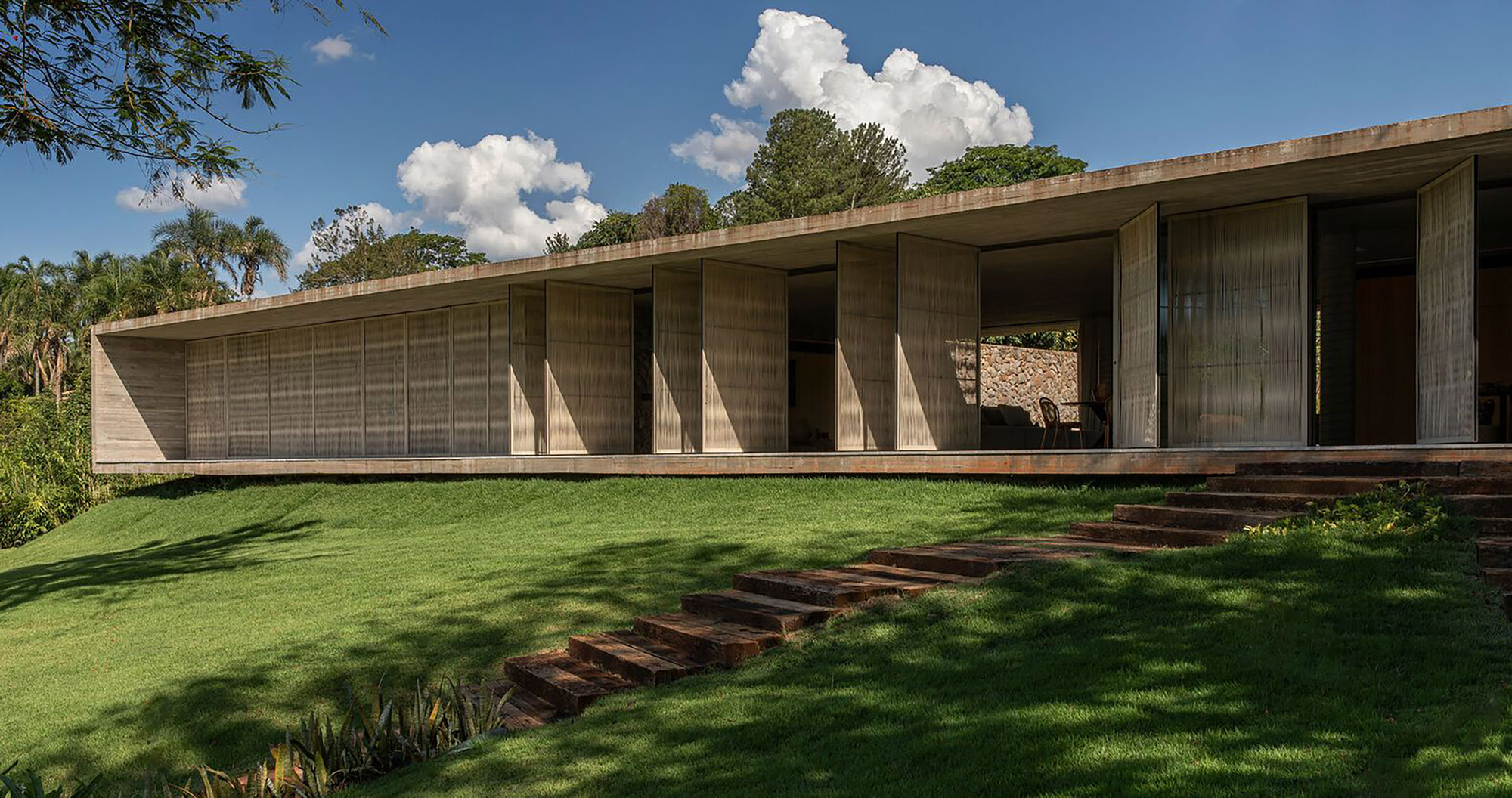 Lake house design by mf+arquitetos